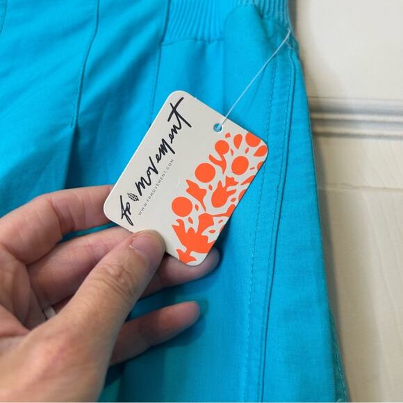 Free People FP Movement Teal Blue Mesmerize Me Cargo Pants Logo Trim Small NWT - Picture 5 of 10